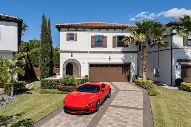 8113 Via Vittoria Way, Orlando, FL 32819 - mediterranean / spanish house with stucco siding, an attached garage, a tile roof, and driveway
