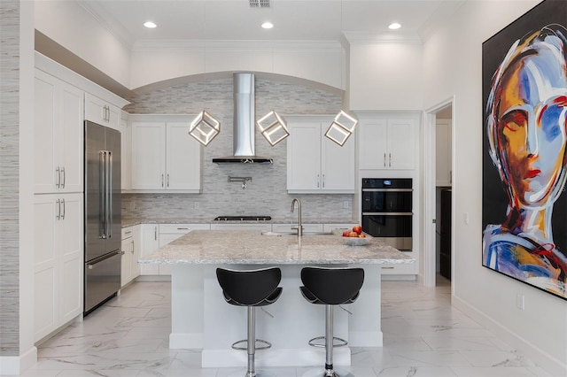 8113 Via Vittoria Way, Orlando, FL 32819 - kitchen with black appliances, light marble finish flooring, wall chimney exhaust hood, crown molding, and a center island with sink