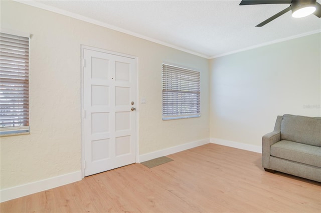2893 S Osceola Ave Unit E6, Orlando, FL 32806 - unfurnished room featuring light wood finished floors, ornamental molding, ceiling fan, and baseboards