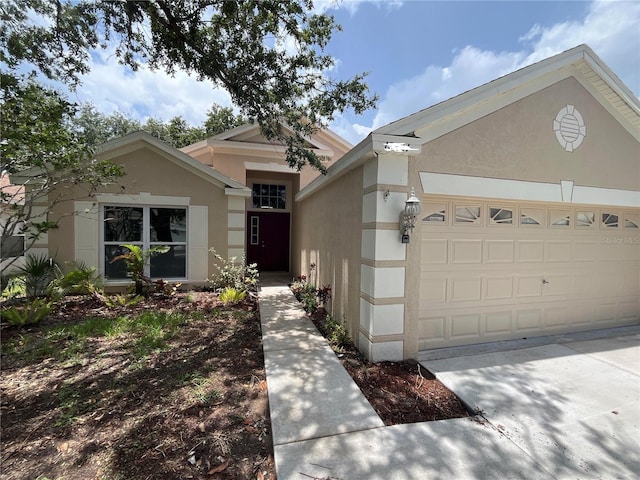 12421 Early Run Ln, Riverview, FL 33578 - ranch-style house with stucco siding, an attached garage, and concrete driveway