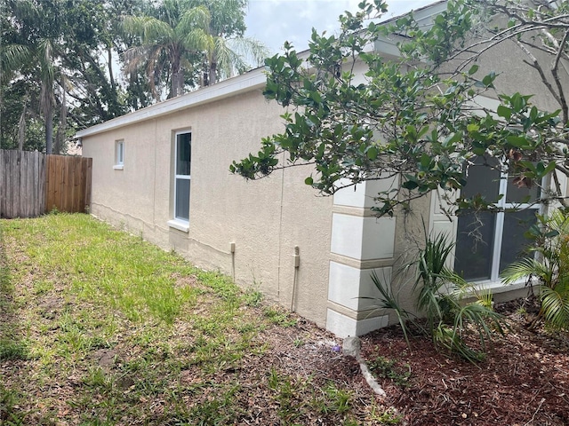 12421 Early Run Ln, Riverview, FL 33578 - view of home's exterior featuring stucco siding