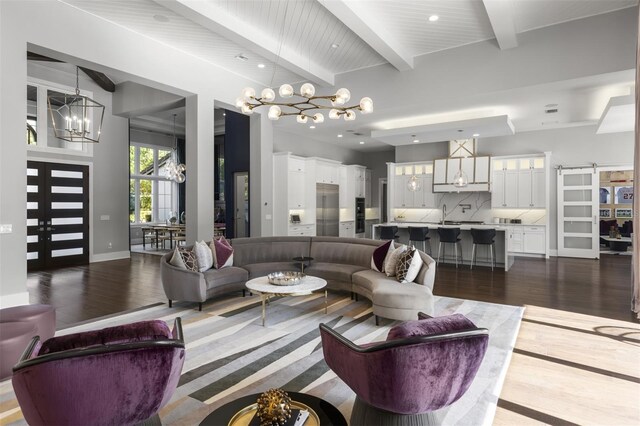 3428 Chaine Du Lac Blvd, Windermere, FL 34786 - living area with a chandelier, dark wood finished floors, beam ceiling, and recessed lighting