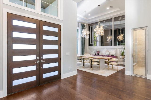 3428 Chaine Du Lac Blvd, Windermere, FL 34786 - foyer with a chandelier, dark wood-style floors, a towering ceiling, recessed lighting, and french doors