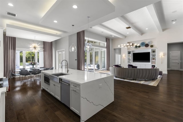 3428 Chaine Du Lac Blvd, Windermere, FL 34786 - kitchen with a chandelier, dishwasher, dark wood-type flooring, open floor plan, and light stone countertops