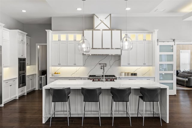 3428 Chaine Du Lac Blvd, Windermere, FL 34786 - kitchen featuring glass insert cabinets, decorative backsplash, white cabinets, and recessed lighting