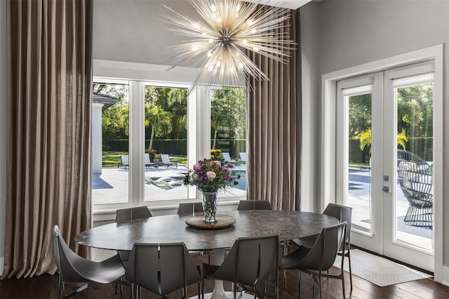 3428 Chaine Du Lac Blvd, Windermere, FL 34786 - dining room with french doors, a chandelier, and wood finished floors