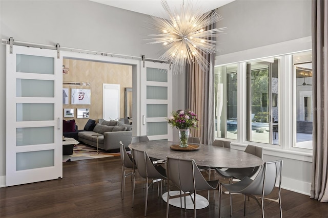 3428 Chaine Du Lac Blvd, Windermere, FL 34786 - dining room with a barn door, a chandelier, and healthy amount of natural light