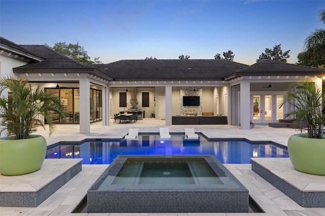 3428 Chaine Du Lac Blvd, Windermere, FL 34786 - rear view of house featuring a ceiling fan, french doors, an outdoor living space, and an outdoor pool