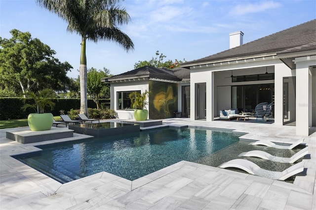 3428 Chaine Du Lac Blvd, Windermere, FL 34786 - swimming pool with a patio and outdoor lounge area