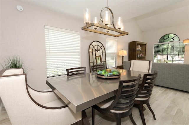1364 Augusta National Blvd, Winter Springs, FL 32708 - dining space featuring lofted ceiling, a chandelier, and wood finished floors