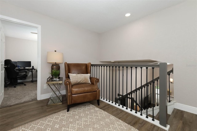 1364 Augusta National Blvd, Winter Springs, FL 32708 - living area with an upstairs landing, wood finished floors, a desk, and baseboards