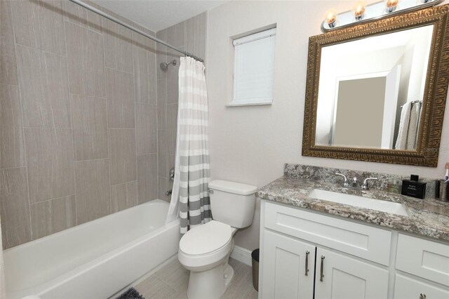 1364 Augusta National Blvd, Winter Springs, FL 32708 - full bath with vanity, toilet, shower / bath combo, tile patterned flooring, and baseboards