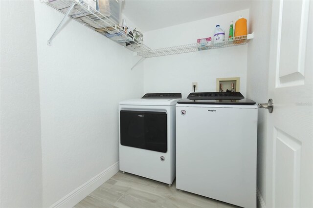 1364 Augusta National Blvd, Winter Springs, FL 32708 - laundry area featuring washing machine and dryer and baseboards