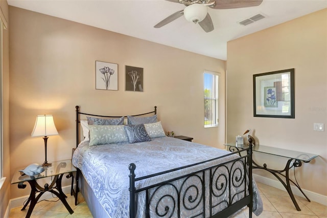 2631 Captains Ct, Kissimmee, FL 34746 - bedroom with light tile patterned flooring and ceiling fan
