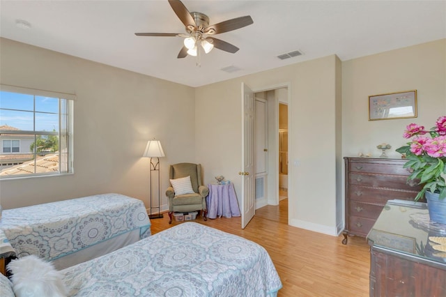 2631 Captains Ct, Kissimmee, FL 34746 - bedroom featuring light wood-type flooring and ceiling fan