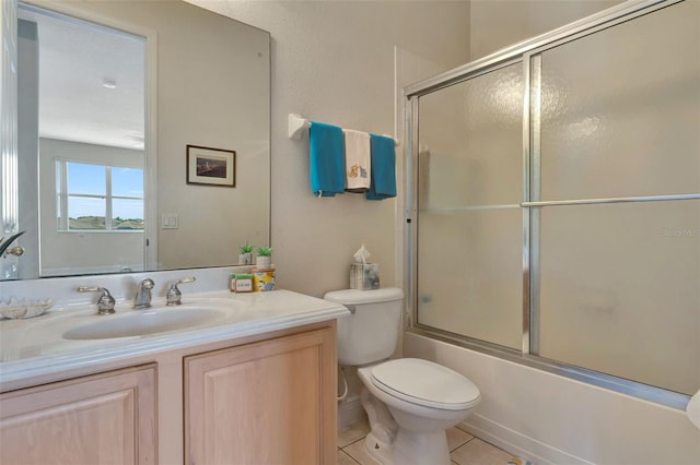 2631 Captains Ct, Kissimmee, FL 34746 - full bath with vanity, enclosed tub / shower combo, and tile patterned flooring