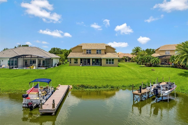 2631 Captains Ct, Kissimmee, FL 34746 - dock with a water view, a lawn, and boat lift