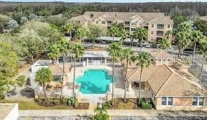 13512 Turtle Marsh Loop Unit 729, Orlando, FL 32837 - view of subject property featuring a pool