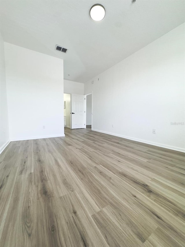 13512 Turtle Marsh Loop Unit 729, Orlando, FL 32837 - spare room featuring baseboards and wood finished floors