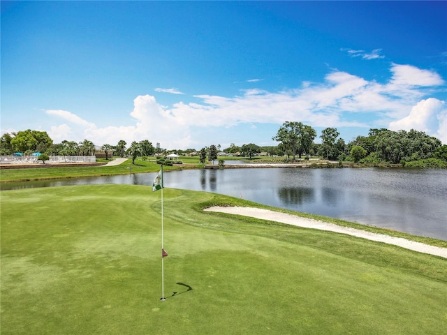 3944 Atrium Dr Unit 4, Orlando, FL 32822 - view of community with a water view, golf course view, and an area to practice putting