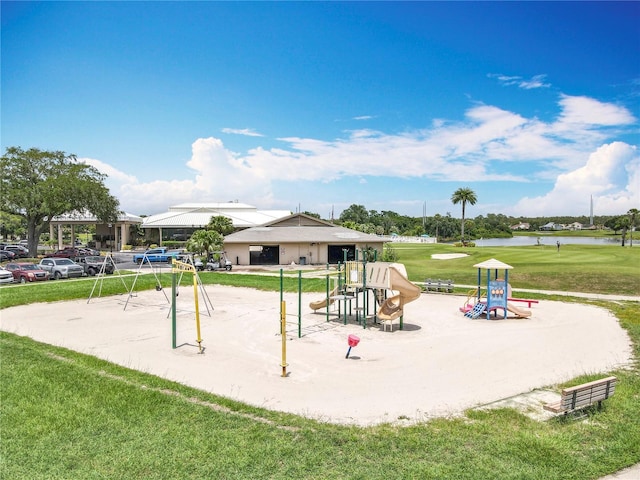 3944 Atrium Dr Unit 4, Orlando, FL 32822 - communal playground with a water view and a lawn