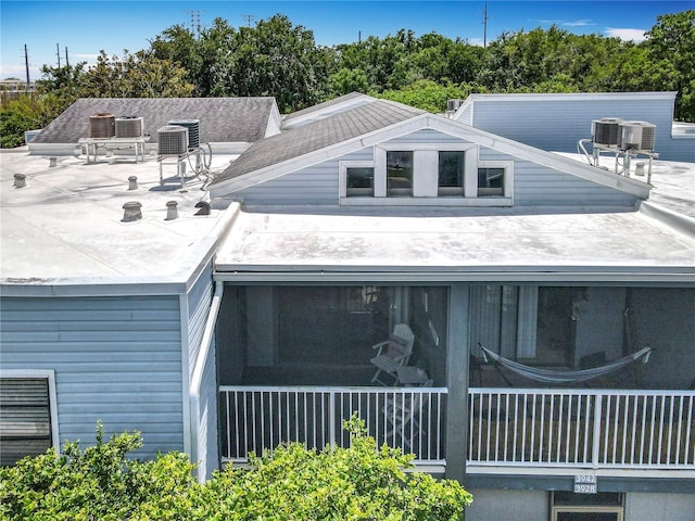3944 Atrium Dr Unit 4, Orlando, FL 32822 - view of front of property featuring a patio, a sunroom, and cooling unit