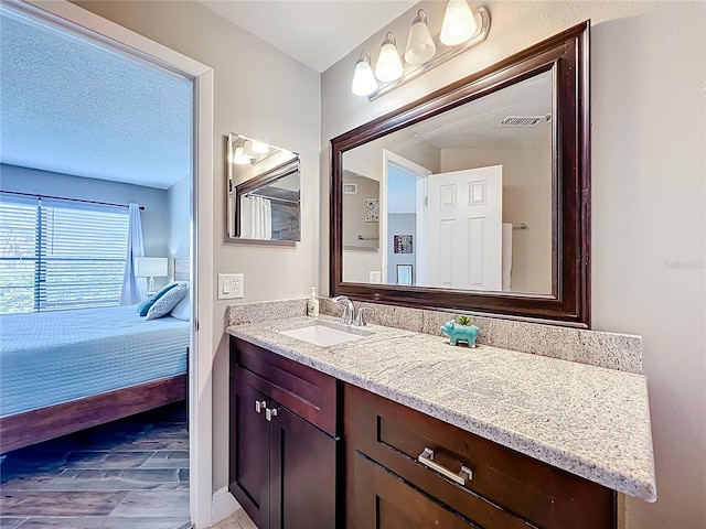 3944 Atrium Dr Unit 4, Orlando, FL 32822 - bathroom featuring vanity and baseboards