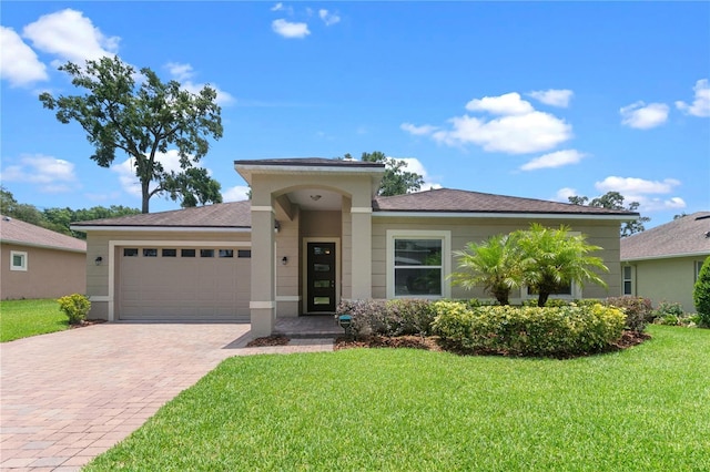 1812 Stoneywood Way, Apopka, FL 32712 - single story home with driveway, a garage, a front lawn, and stucco siding