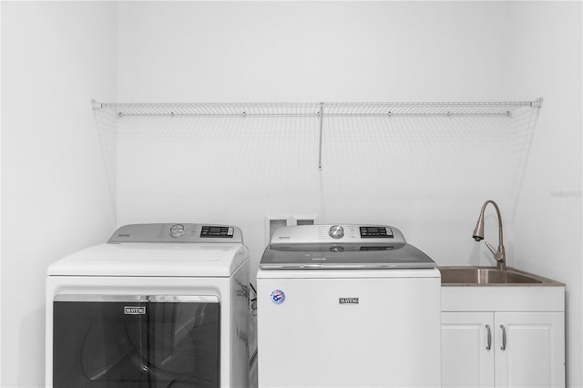 1812 Stoneywood Way, Apopka, FL 32712 - laundry area with washer and dryer and cabinet space