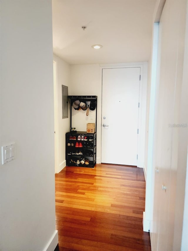 150 E Robinson St Unit 419, Orlando, FL 32801 - corridor with wood finished floors, electric panel, baseboards, and recessed lighting