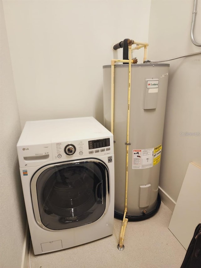 150 E Robinson St Unit 419, Orlando, FL 32801 - laundry room with washer / clothes dryer, water heater, baseboards, and carpet