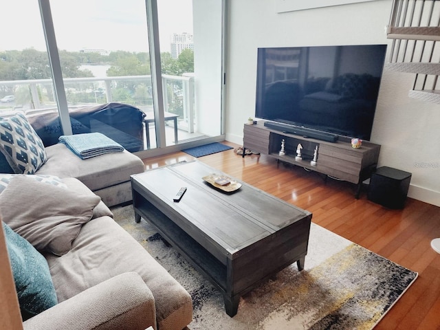 150 E Robinson St Unit 419, Orlando, FL 32801 - living area featuring wood finished floors and baseboards