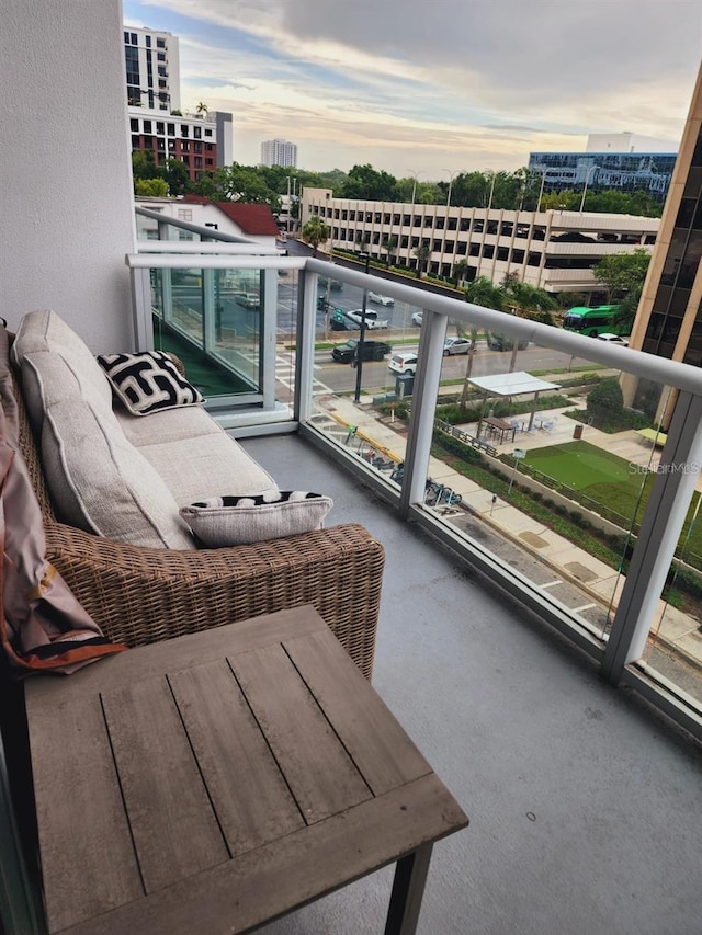 150 E Robinson St Unit 419, Orlando, FL 32801 - balcony at dusk featuring a city view