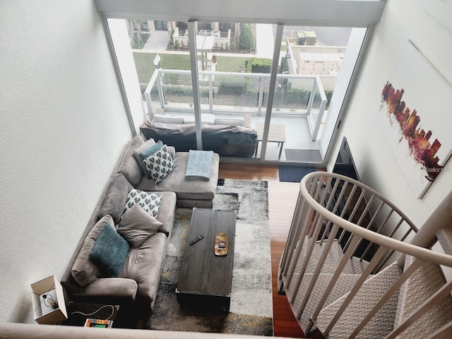 150 E Robinson St Unit 419, Orlando, FL 32801 - living area with wood finished floors and a textured wall