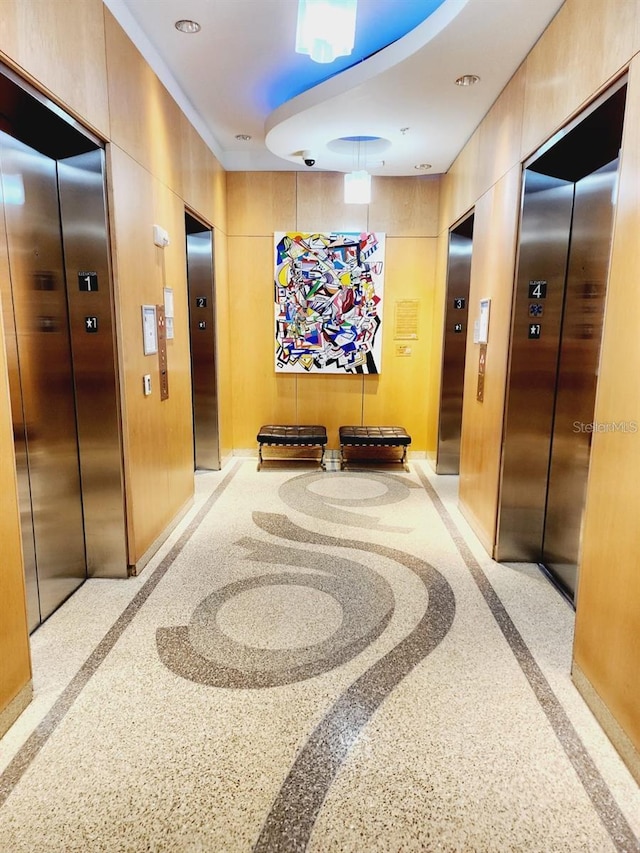 150 E Robinson St Unit 419, Orlando, FL 32801 - hallway with elevator and inlaid floor details