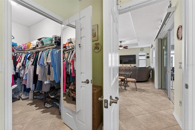 8336 SW 77th Ct, Ocala, FL 34476 - walk in closet featuring light tile patterned floors and a ceiling fan