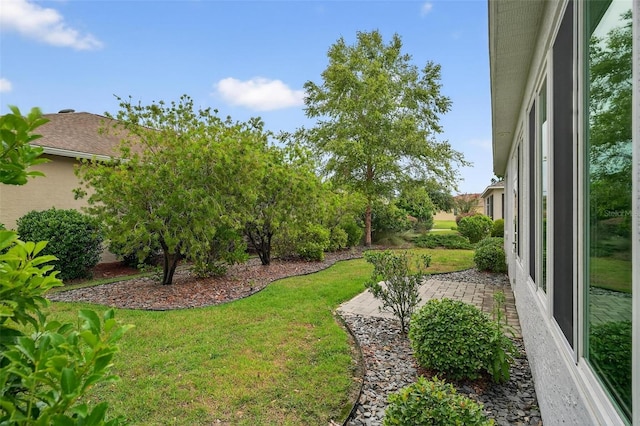 8336 SW 77th Ct, Ocala, FL 34476 - view of green lawn featuring a patio area