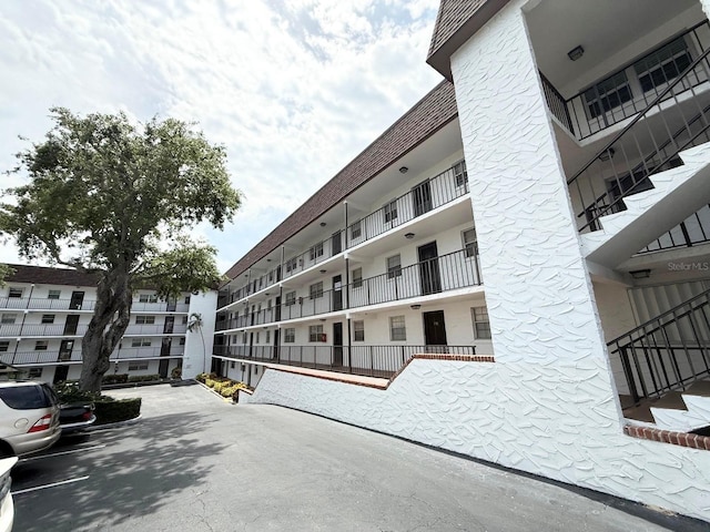 118 S Halifax Ave Unit 409, Daytona Beach, FL 32118 - view of apartment building / complex