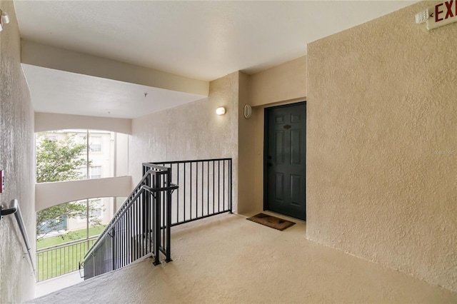 3000 Laurel Park Ln Unit 308, Kissimmee, FL 34741 - entrance to property with stucco siding and a balcony