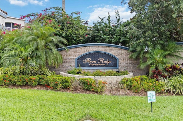 3000 Laurel Park Ln Unit 308, Kissimmee, FL 34741 - community / neighborhood sign with a lawn