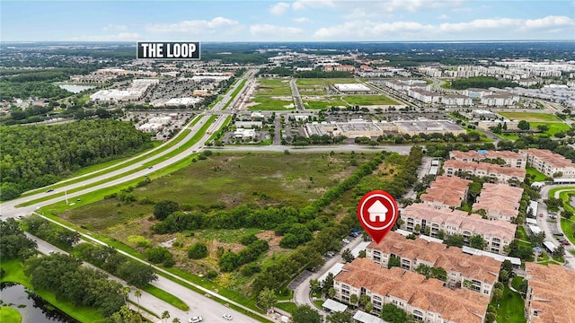 3000 Laurel Park Ln Unit 308, Kissimmee, FL 34741 - aerial overview of property's location featuring a nearby body of water