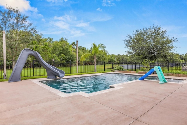 10996 Inside Loop, Orlando, FL 32825 - view of swimming pool featuring a water slide and a patio
