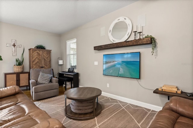 10996 Inside Loop, Orlando, FL 32825 - carpeted living room featuring baseboards