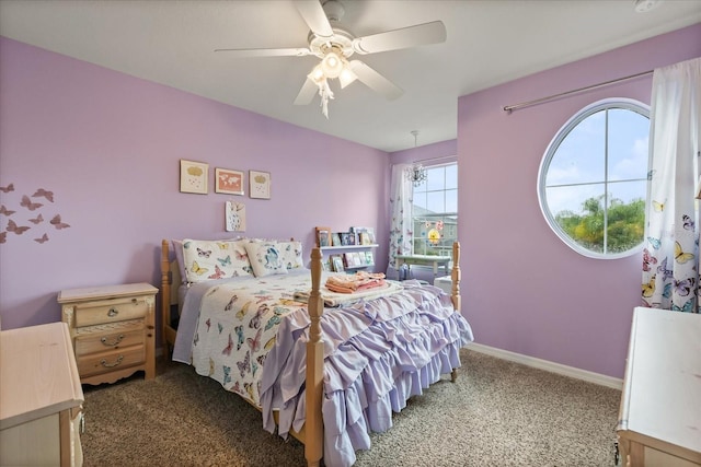 10996 Inside Loop, Orlando, FL 32825 - carpeted bedroom featuring ceiling fan and baseboards