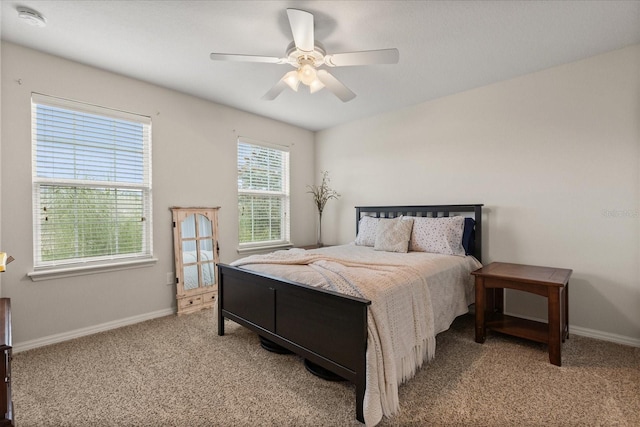 10996 Inside Loop, Orlando, FL 32825 - bedroom featuring carpet and ceiling fan
