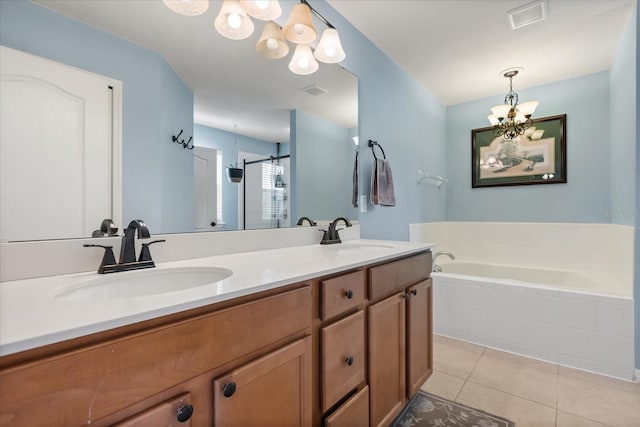 10996 Inside Loop, Orlando, FL 32825 - bathroom with a bath, tile patterned floors, double vanity, a chandelier, and a stall shower