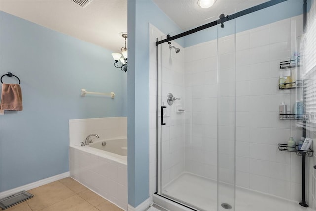 10996 Inside Loop, Orlando, FL 32825 - full bath featuring a bath, a stall shower, and tile patterned flooring