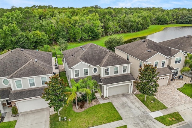 10996 Inside Loop, Orlando, FL 32825 - view of subject property with a large body of water and a heavily wooded area