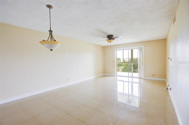 2615 NE 3rd Ct Unit 416, Boynton Beach, FL 33435 - unfurnished room featuring ceiling fan, a textured ceiling, and baseboards