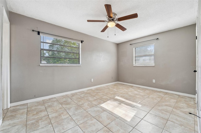 510 Peach Tree Ln, Altamonte Springs, FL 32701 - empty room featuring healthy amount of natural light, tile patterned floors, a textured ceiling, and ceiling fan